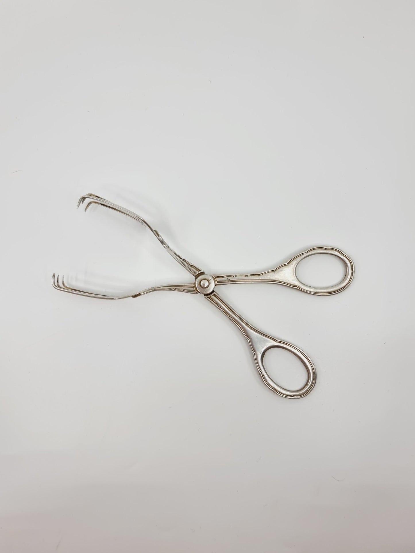 Pince à sucre en métal argenté