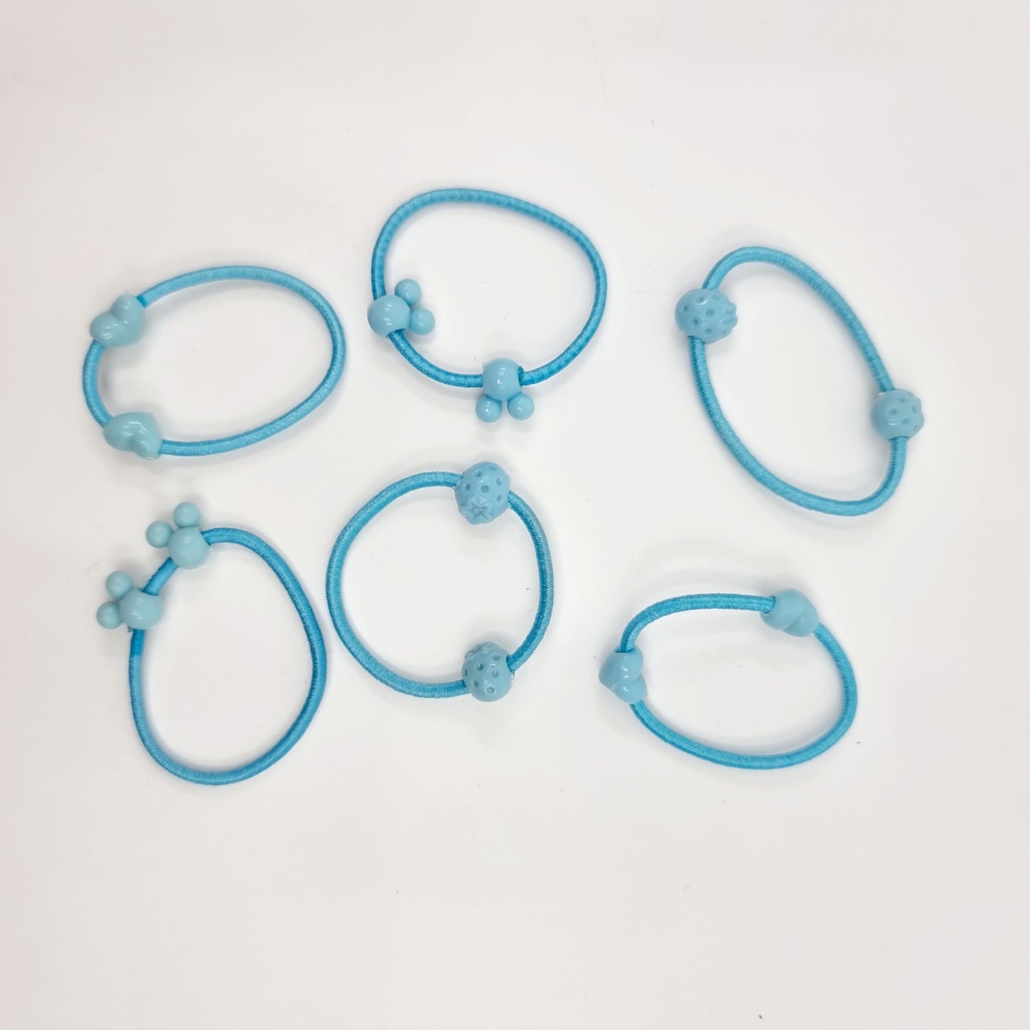 Elastique cheveux avec perles décoratives (4 pièces)