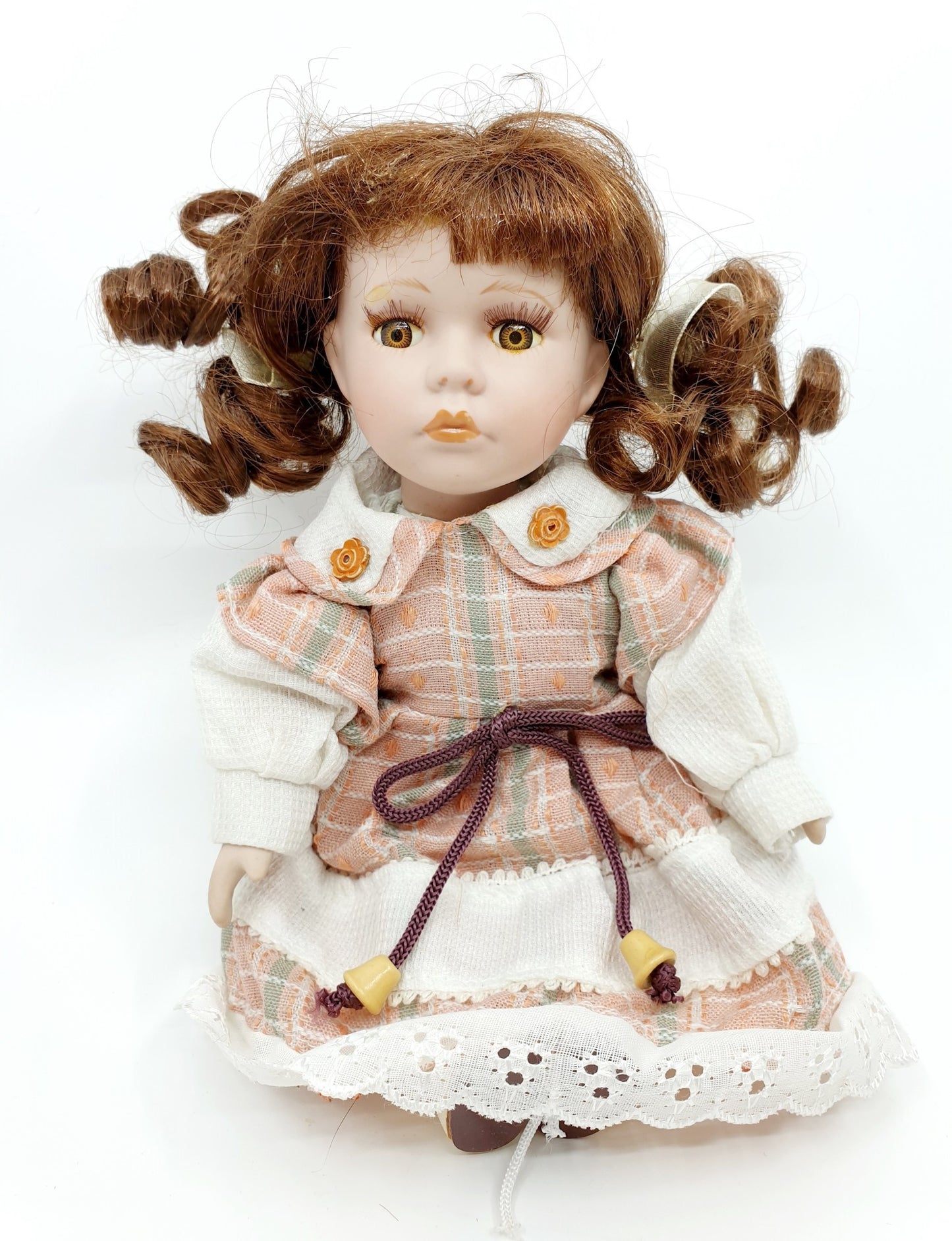 Poupée petite - robe à carreaux