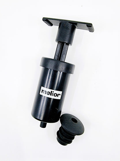 Pompe à vide avec bouchon