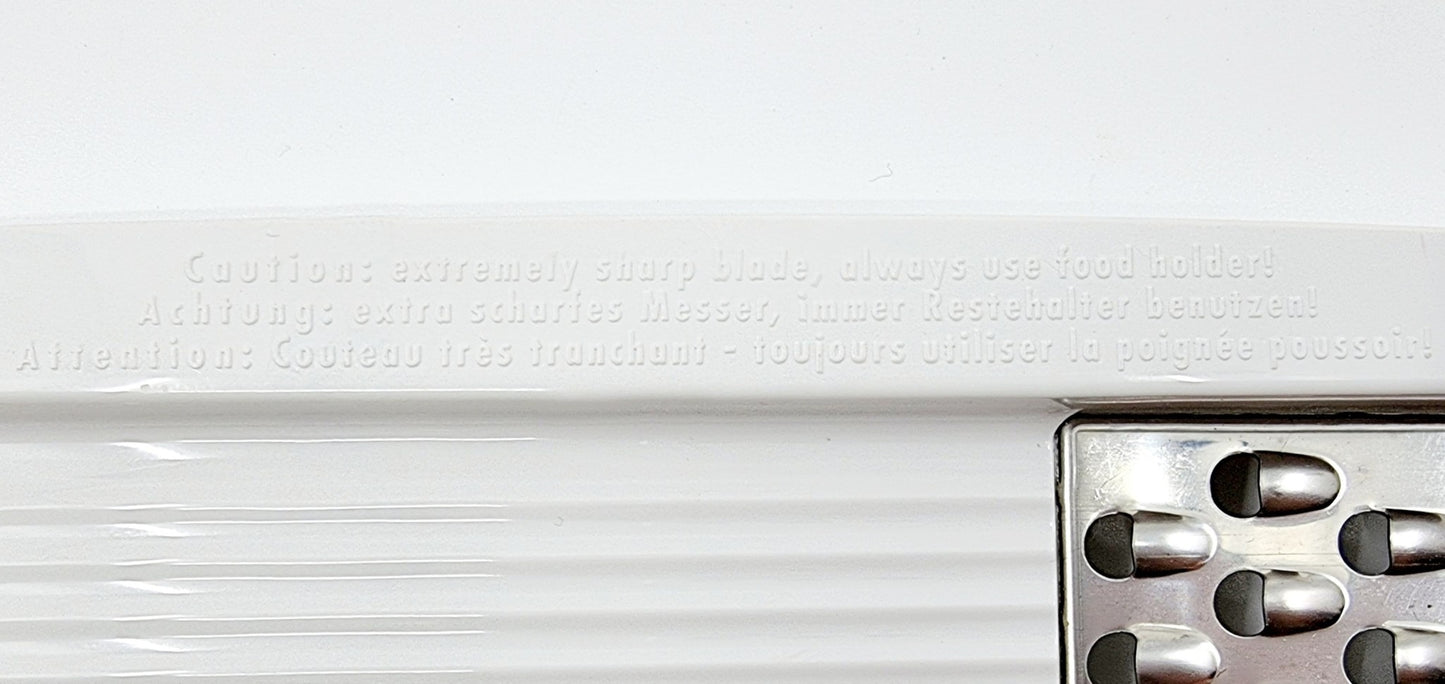 Râpe avec 4 lames interchangeables