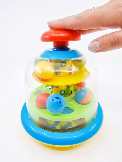 Toupie magique à balles