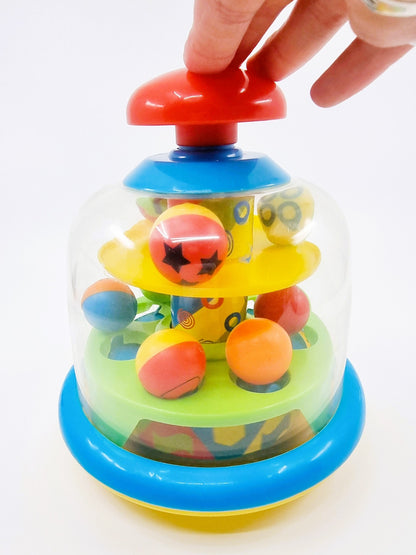 Toupie magique à balles