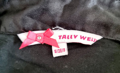 Tunique noire à poches apparentes (SIZE : S/36)