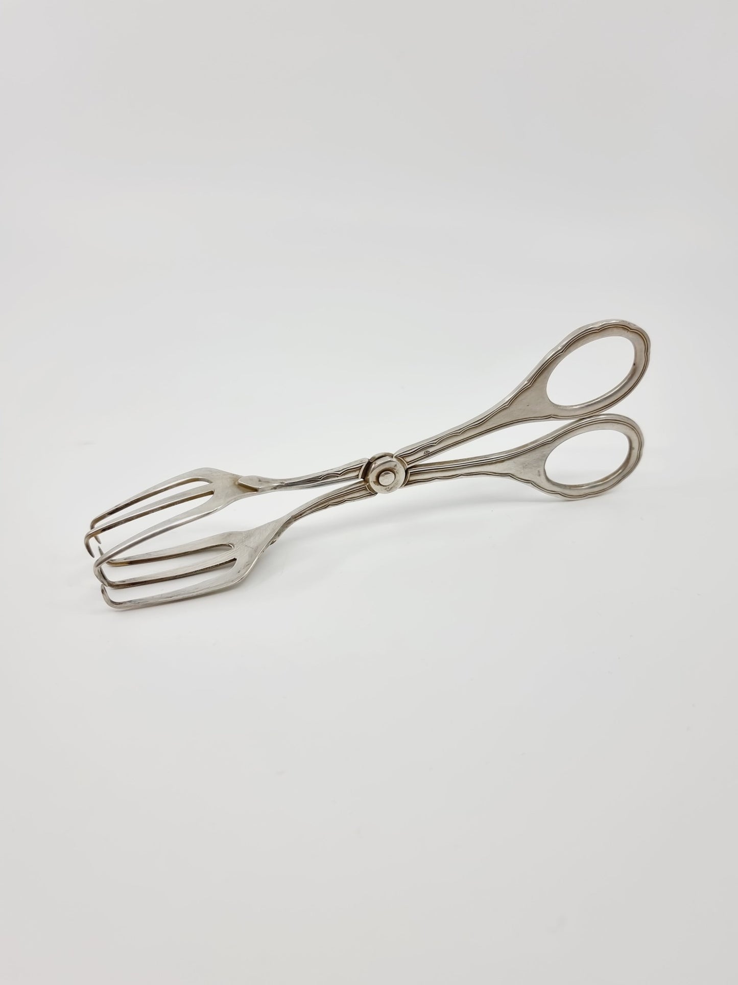 Pince à sucre en métal argenté