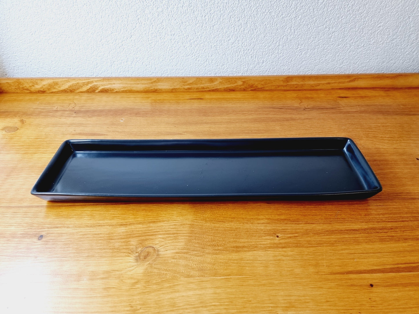 Plat rectangulaire noir en céramique