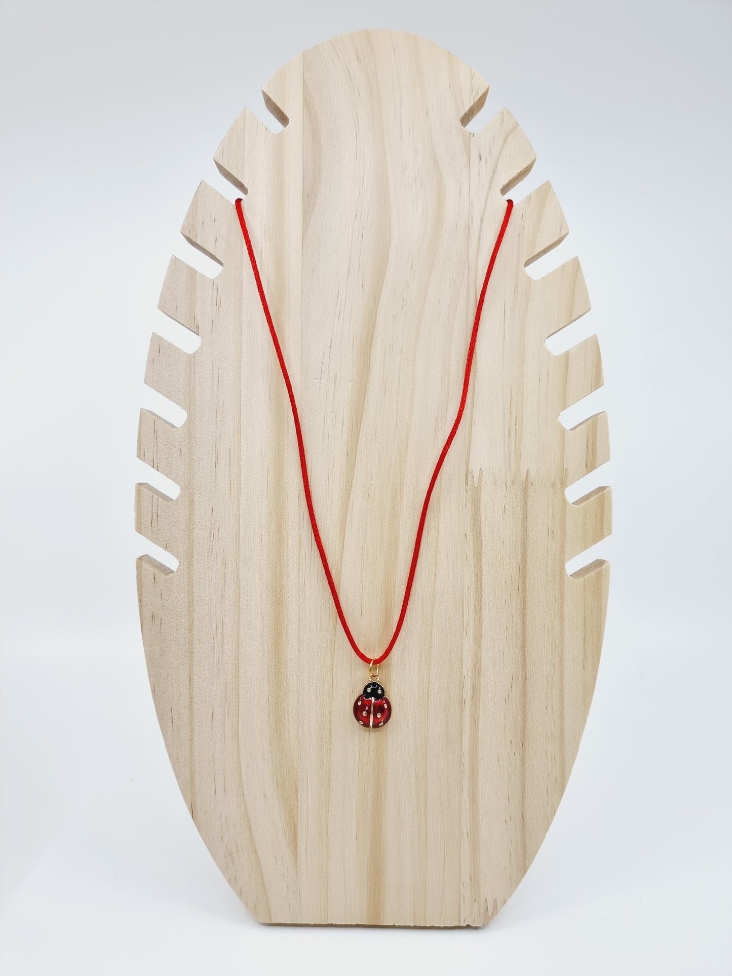 Collier rouge  - Coccinelle