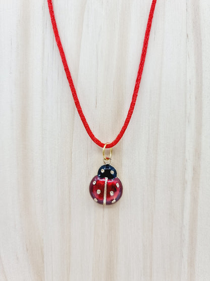 Collier rouge  - Coccinelle