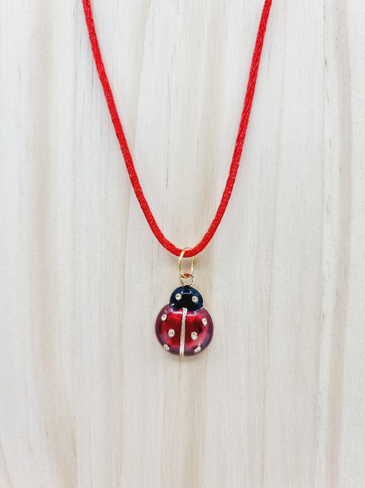Collier rouge  - Coccinelle