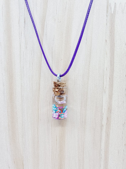 Collier fiole - papillon