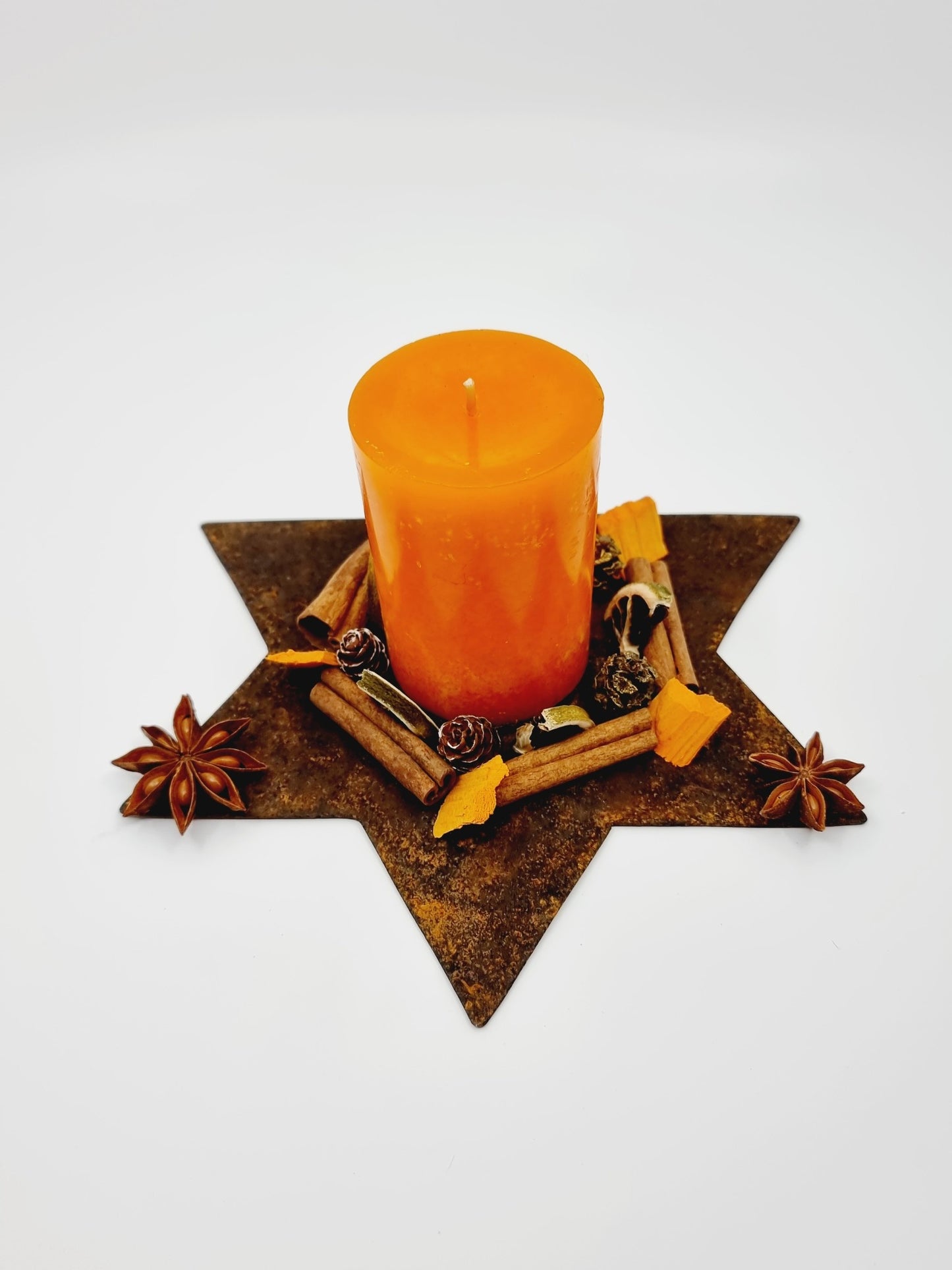 Bougeoir étoile de Noël et ses épices