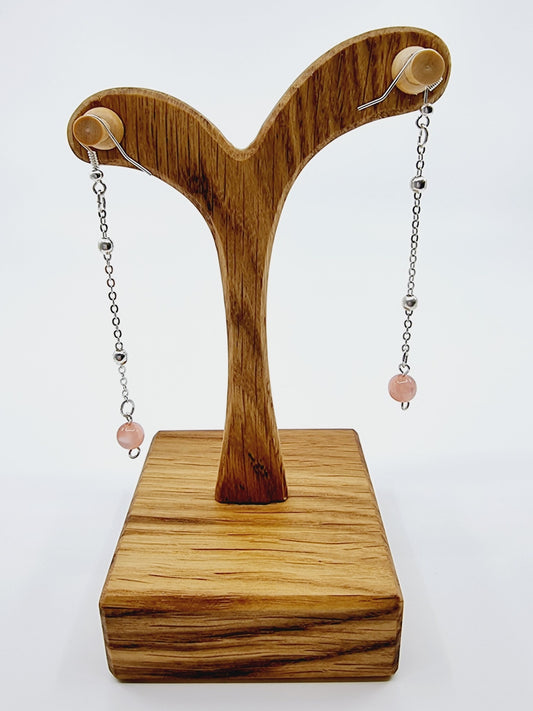 Boucles d'oreilles longues - boule rose