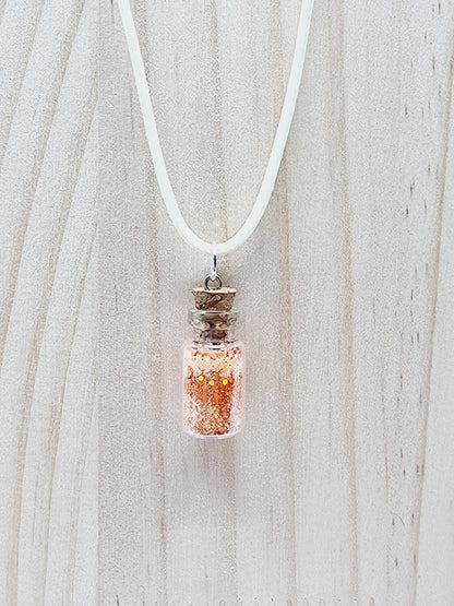 Collier fiole - paillettes orangées