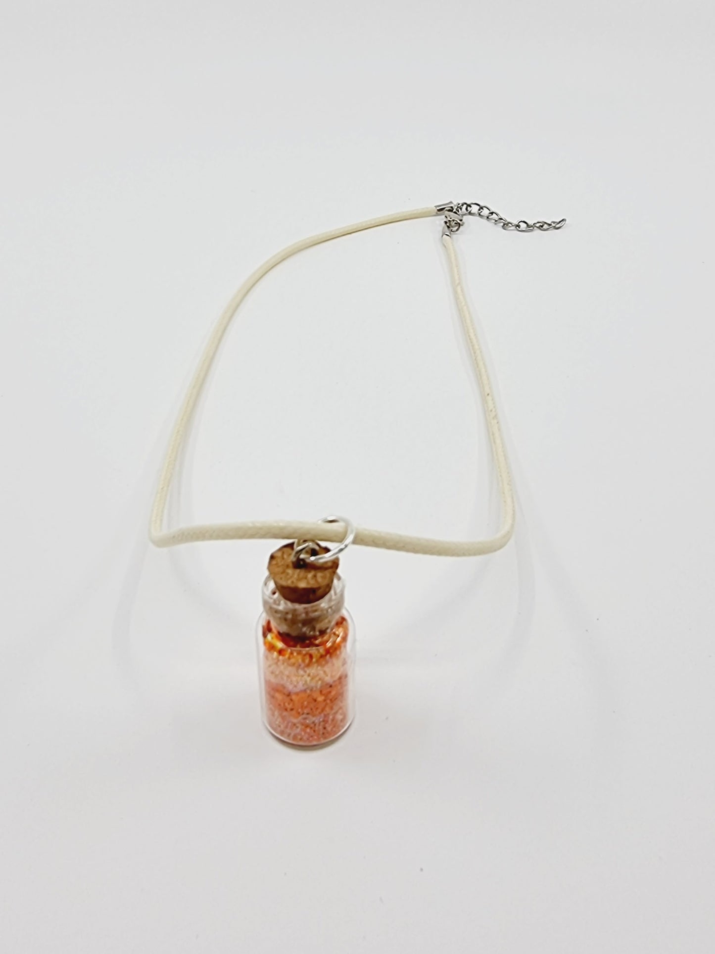 Collier fiole - paillettes orangées