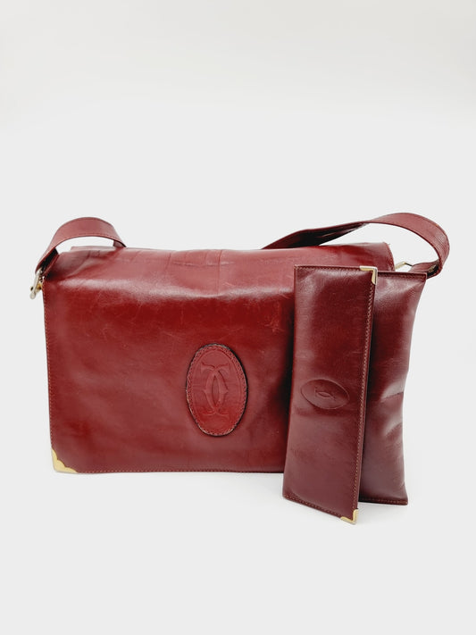 Sac et portefeuille en cuir Cartier