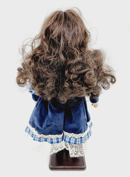 Poupée en porcelaine - Maribelle