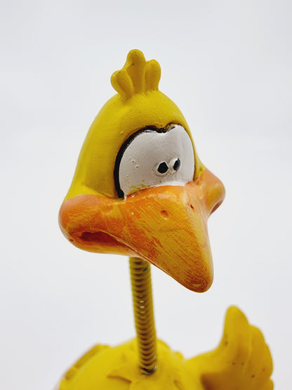 Poussin dans sa coquille