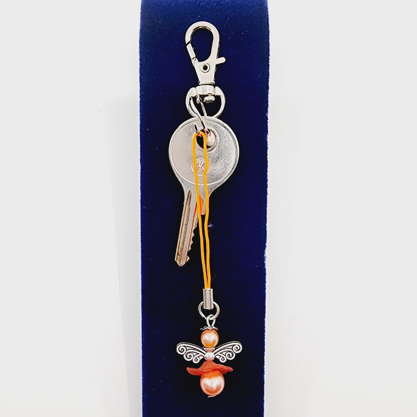 Ange porte-bonheur - Libellule rose orangée