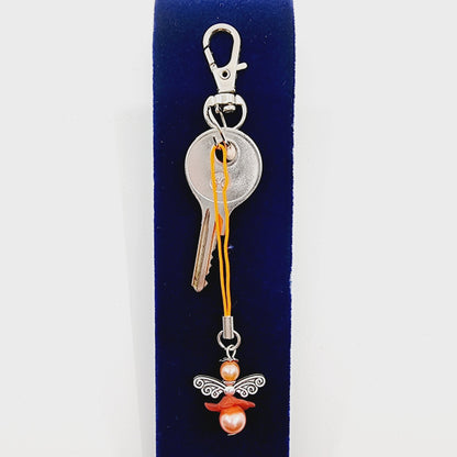 Ange porte-bonheur - Libellule rose orangée