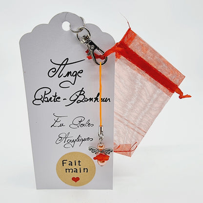 Ange porte-bonheur - Libellule rose orangée