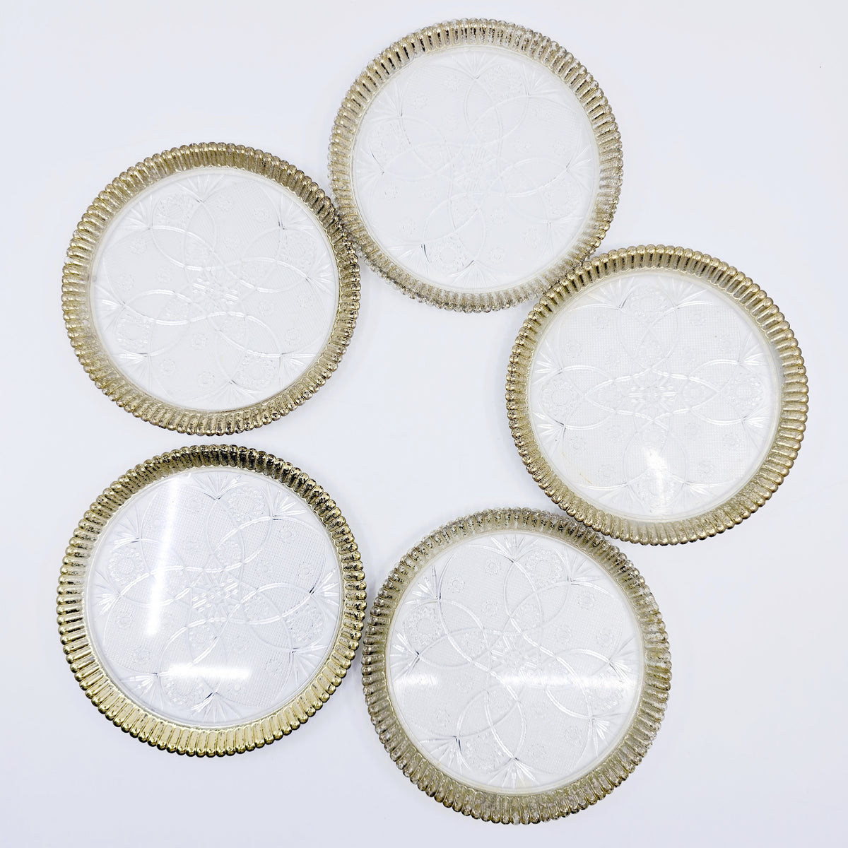 Dessous de verre avec ornements dorés (5 pièces)