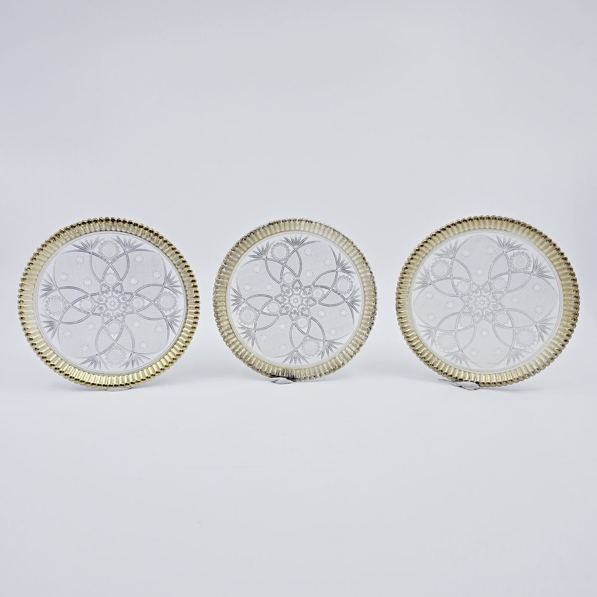 Dessous de verre avec ornements dorés (5 pièces)