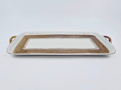 Plat à cake ancien en porcelaine