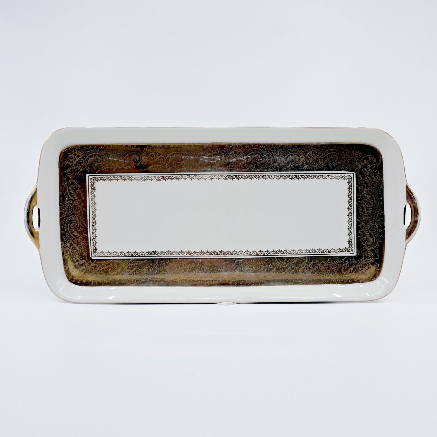 Plat à cake ancien en porcelaine