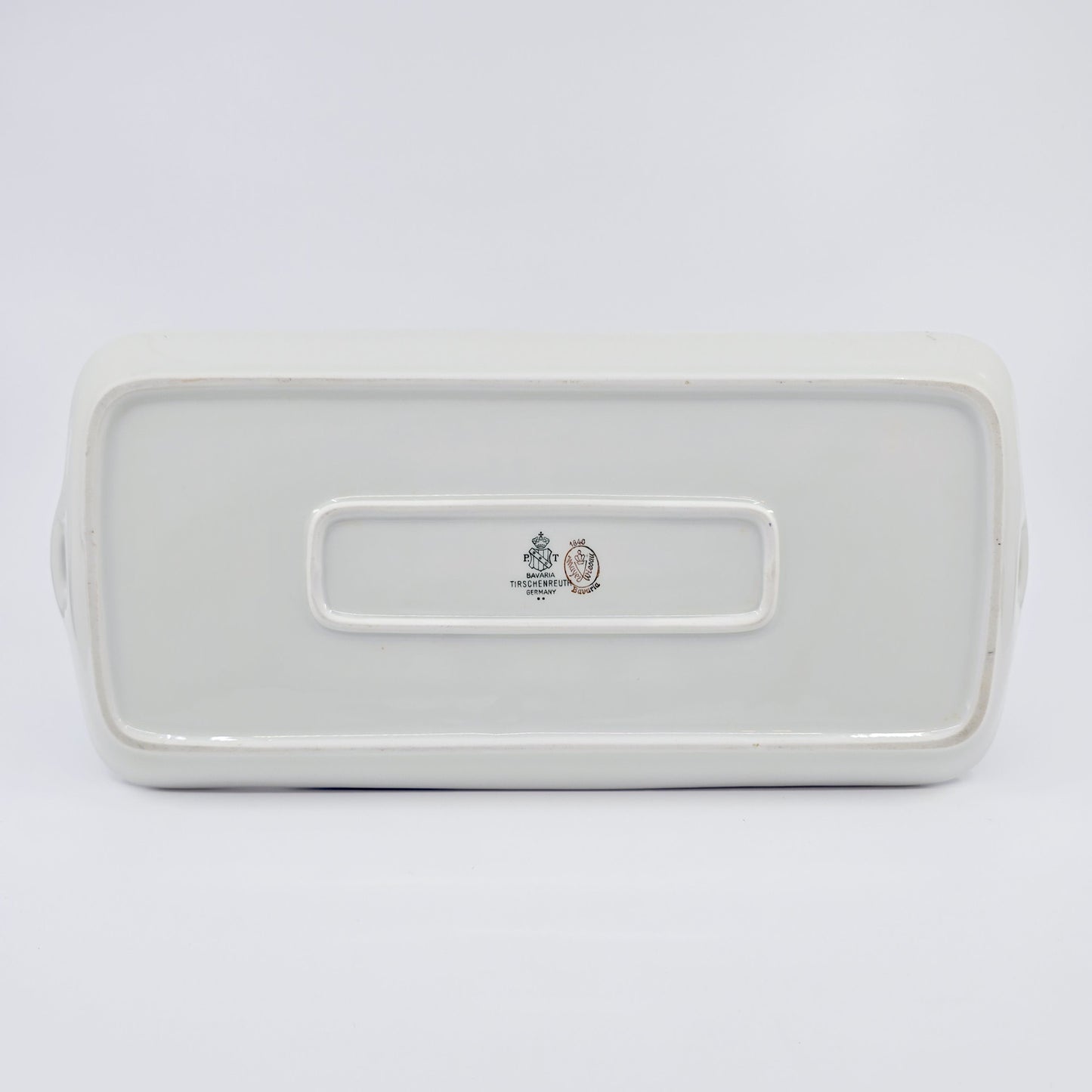 Plat à cake ancien en porcelaine