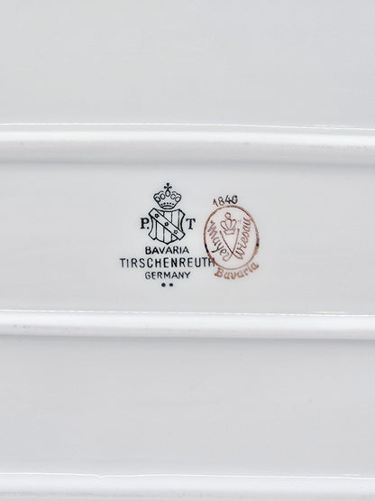 Plat à cake ancien en porcelaine