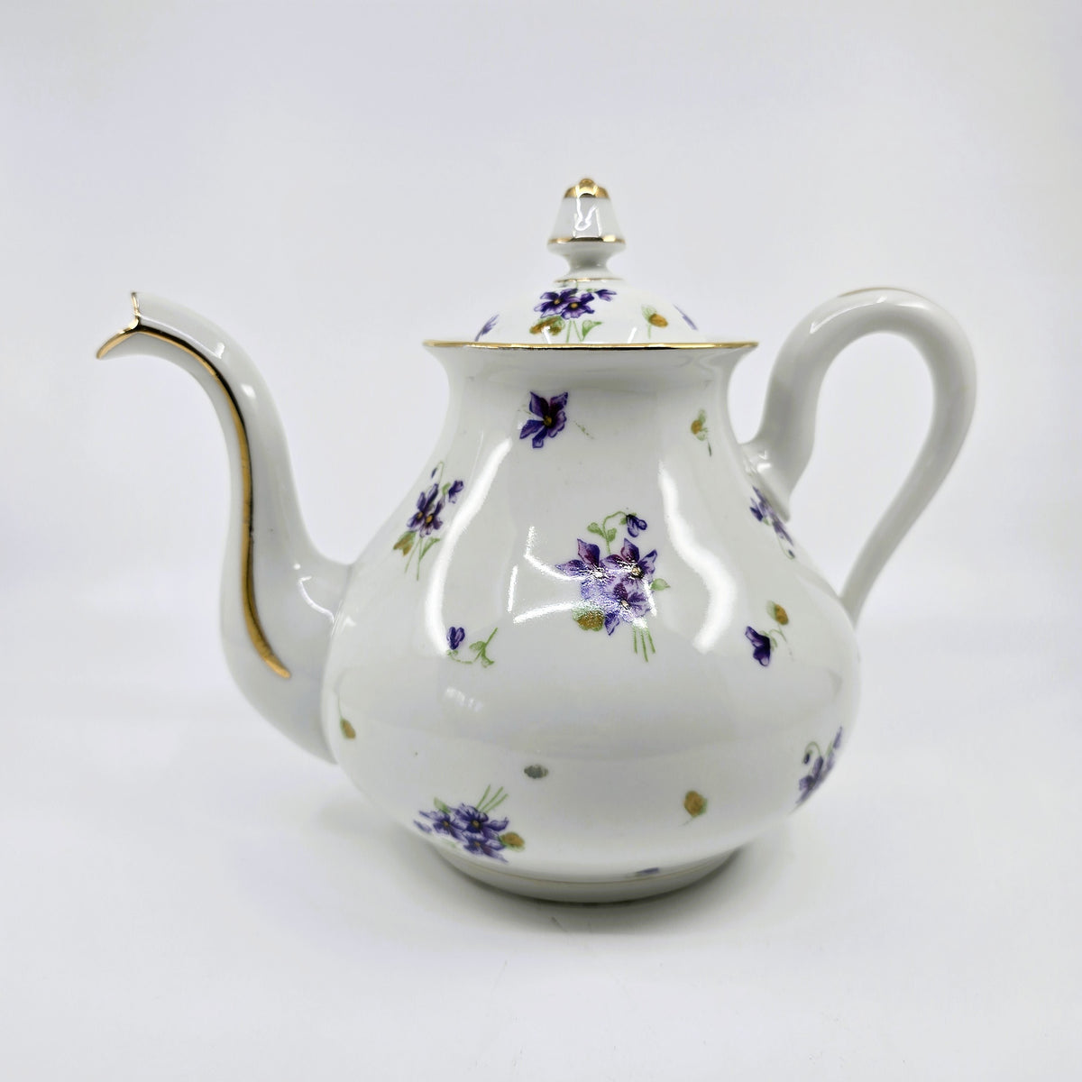 Service ancien en porcelaine fleurie – 41 pièces