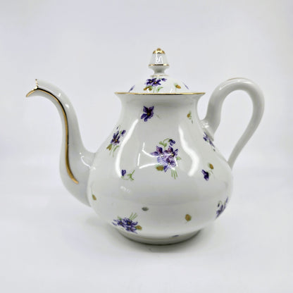 Service ancien en porcelaine fleurie – 41 pièces