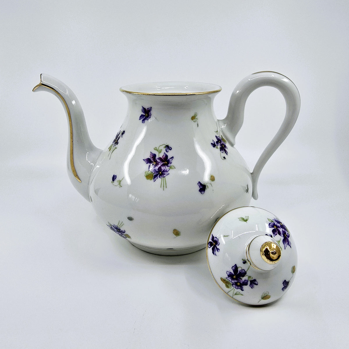 Service ancien en porcelaine fleurie – 41 pièces