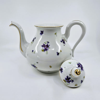Service ancien en porcelaine fleurie – 41 pièces