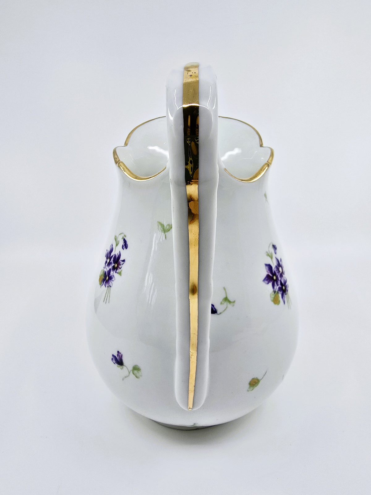 Service ancien en porcelaine fleurie – 41 pièces