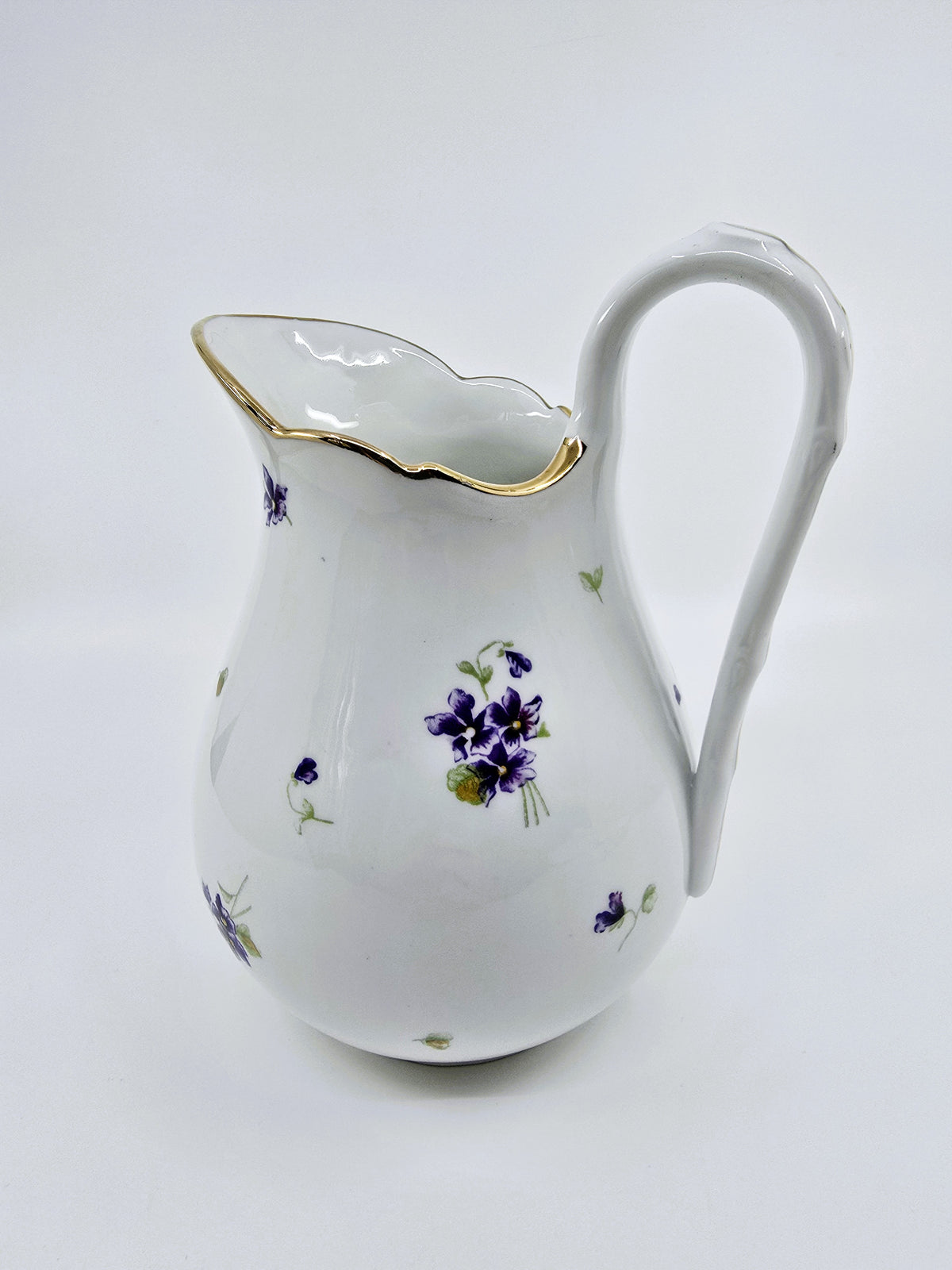 Service ancien en porcelaine fleurie – 41 pièces