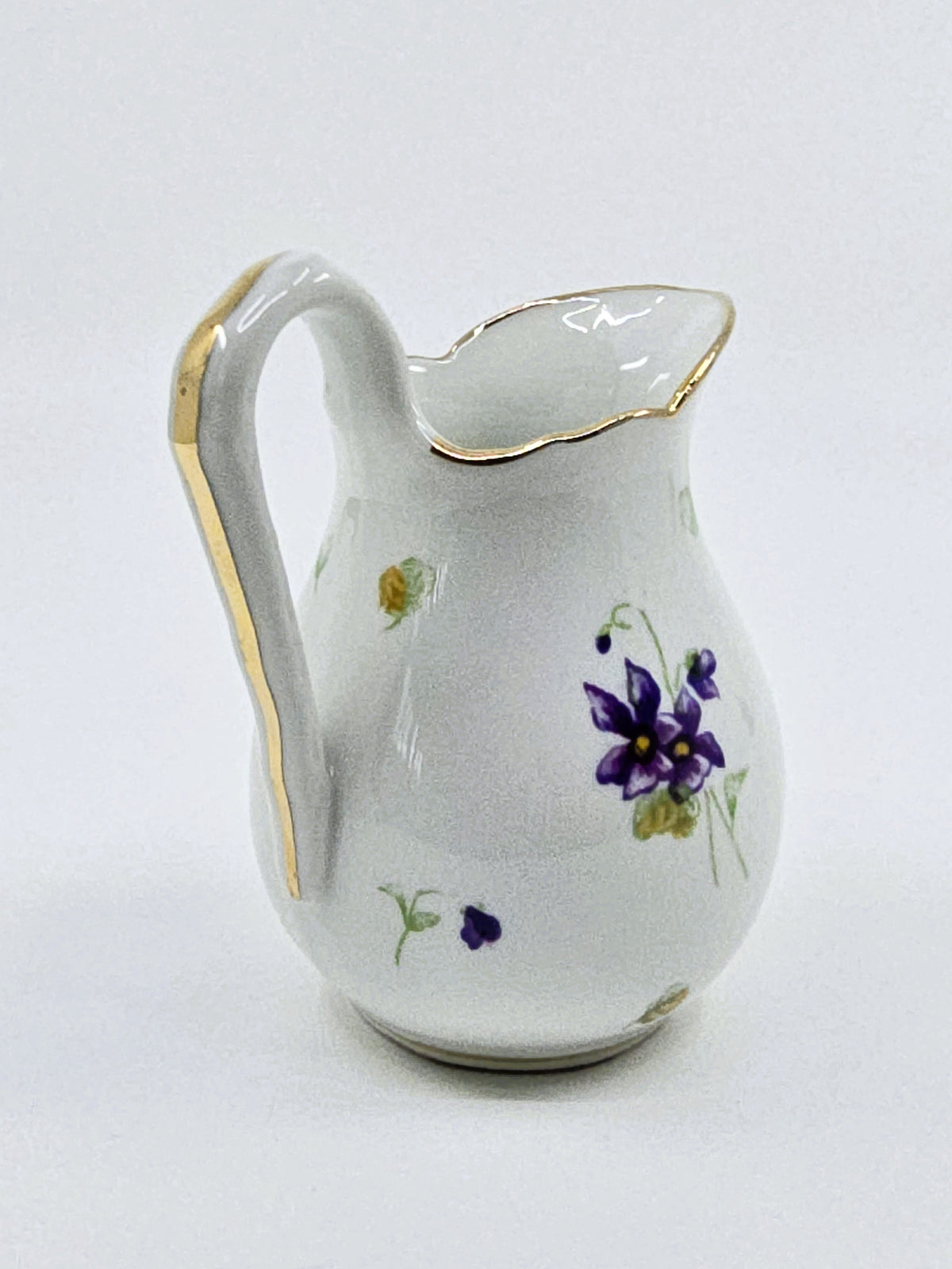 Service ancien en porcelaine fleurie – 41 pièces