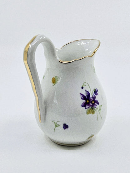 Service ancien en porcelaine fleurie – 41 pièces