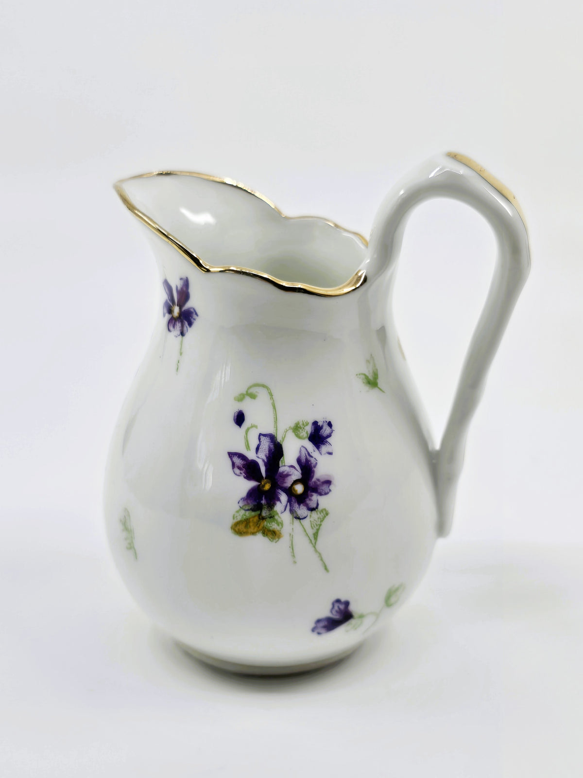 Service ancien en porcelaine fleurie – 41 pièces