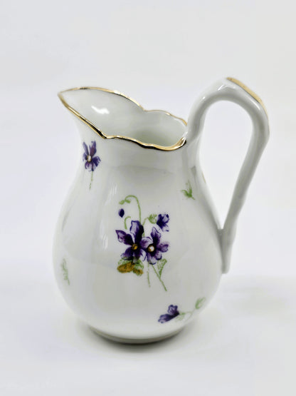 Service ancien en porcelaine fleurie – 41 pièces