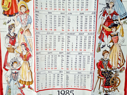 Linge de cuisine - calendrier 1985 costumes suisses traditionnels (70 X 40 cm)