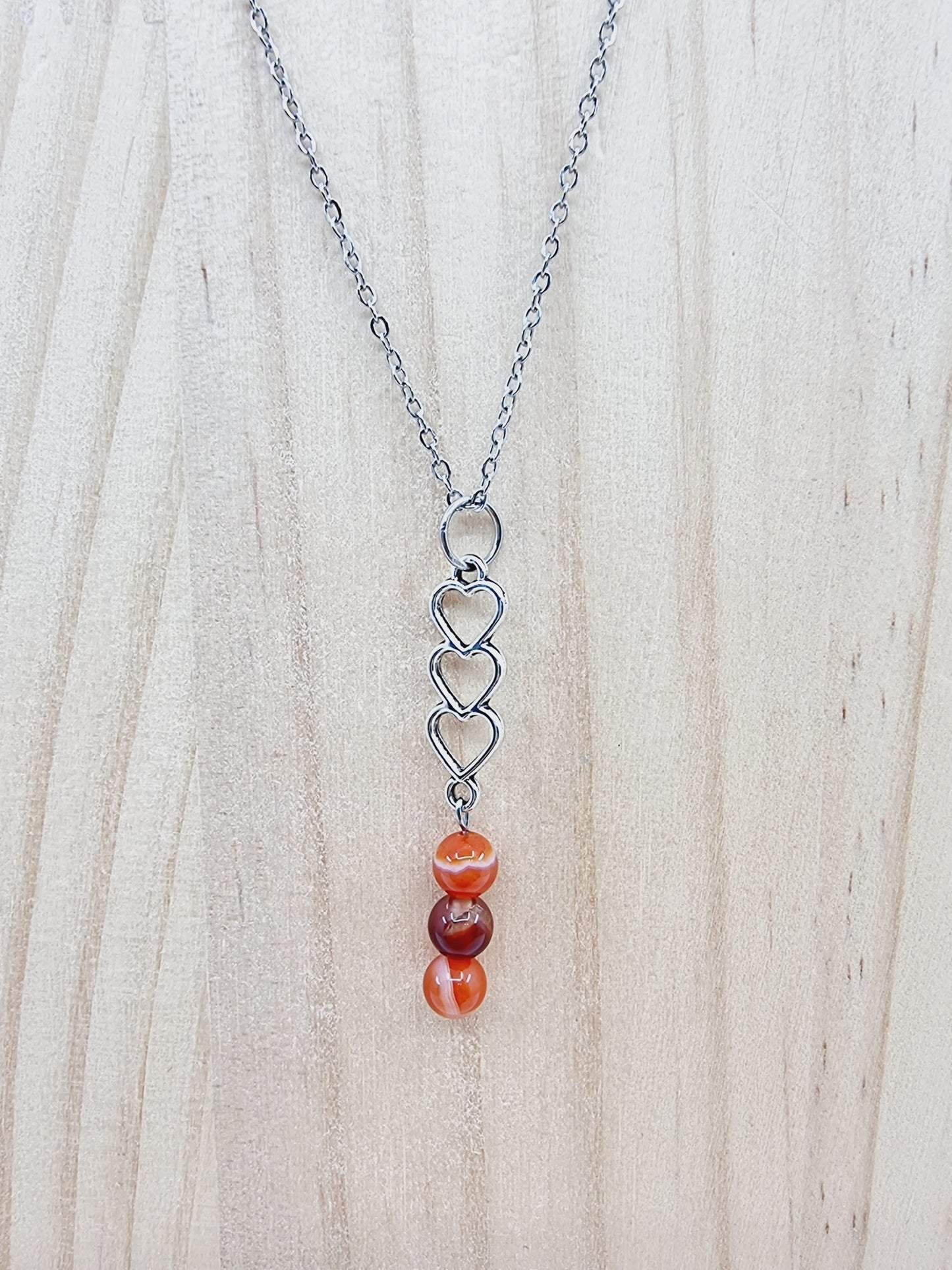 Collier trio de coeurs - Cornaline