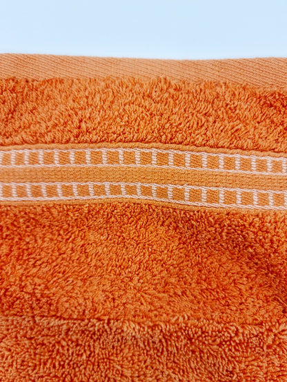 Gant de toilette orange (21 x 16 cm)