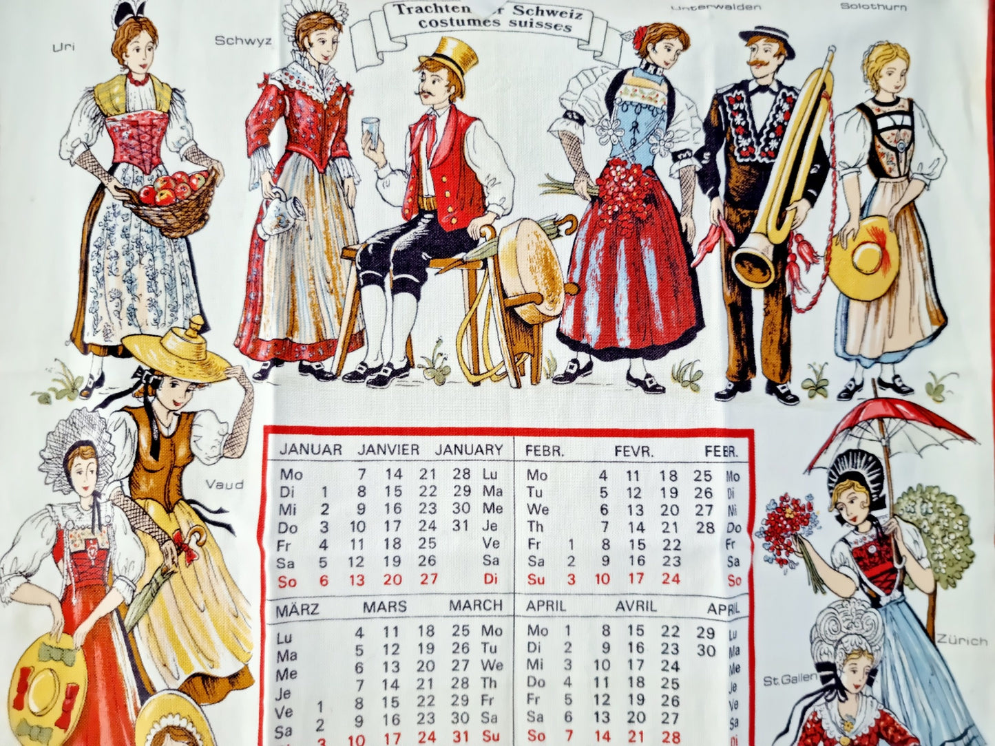 Linge de cuisine - calendrier 1985 costumes suisses traditionnels (70 X 40 cm)