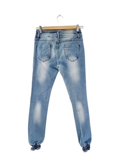 Jeans clair serré sur le bas (SIZE : 34)